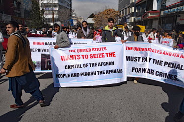 A protest against economic sanctions against the Taliban regime. This protest seemed to be orchestrated by the government as the lay out of the placards was relatively sophisticated and made with expe...
