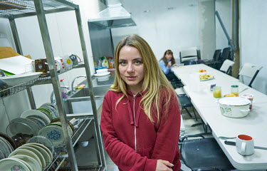 Julia, a second-time refugee, in the kitchens at a Christian church called Door to Heaven where she has found shelter. Her first experience of being a refugee was in when the separatists occupied her...