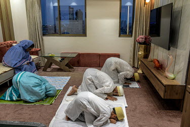 A Dawoodi Bohra Muslim family offer Friday Ramadan prayers at home rather than the mosque because of the second lockdown being implemented across Maharashtra.
