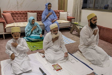 A Dawoodi Bohra Muslim family offer Friday Ramadan prayers at home rather than the mosque because of the second lockdown being implemented across Maharashtra.