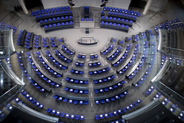 An overview of the empty German parliament (Deutscher Bundestag). Only every second chair is available to the MPs in the chamber to maintain social distancing during the debates as Germany enforces a...