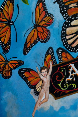 A mural of monarch butterflies.