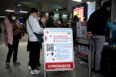 A 'coronabike' stall offering free COVID-19 rapid-testing for 'Foreigners' at the Hauptbahnhof, the railway station where Ukrainian refugees arrive on trains from Poland.
