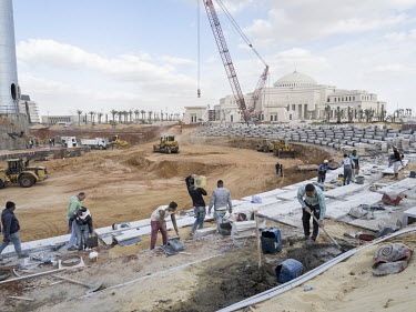 Workers labouring at the People's Square construction site, in front of the Presidential Palace in Egypt's New Administrative Capital. Following persistent problems of overpopulation, pollution and t...