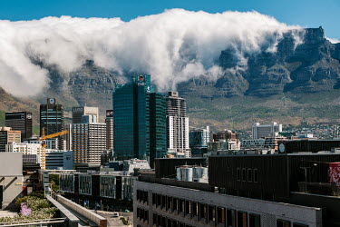 Clouds roll over the top of Table Mountain.