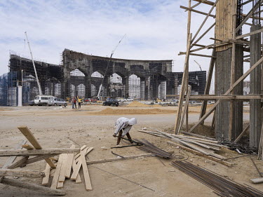 The construction site of one of the giant entrance gates to Egypt's New Administrative Capital.~Following persistent problems of overpopulation, pollution and traffic congestion, the construction of a...