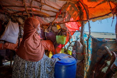 Dehabo Hassan Darror in her temporary shelter in an IDP camp near Oog for people displaced by the region's ongoing drought.