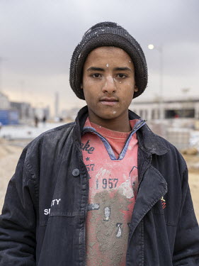 A child worker in Egypt's New Administrative Capital. Following persistent problems of overpopulation, pollution and traffic congestion, the construction of a giant new satellite city in the desert ea...
