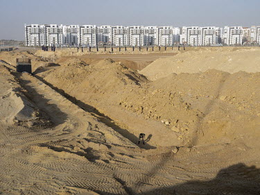 A new residential compound in Egypt's New Administrative Capital.~Following persistent problems of overpopulation, pollution and traffic congestion, the construction of a giant new satellite city in t...