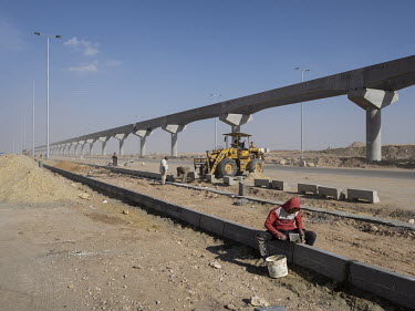 A monorail construction site in Egypt's New Administrative Capital.Following persistent problems of overpopulation, pollution and traffic congestion, the construction of a giant new satellite city in...