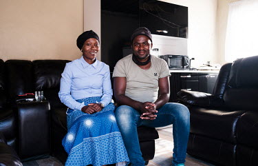 Zikhona Gcakamani and her husband Abongile Mfene at their home in Khayelitsha. Both lead high-angle tree clearing teams that operate at height in dangerous and remote locations, using ropes and climbi...