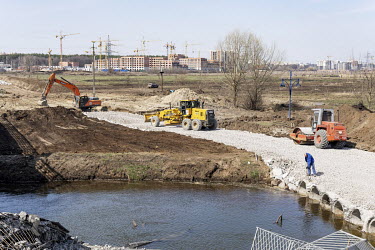 Construction work to make a temporary bridge over the River Irpin (Irpen) following the re-occupation of the commuter town by Ukrainian forces.