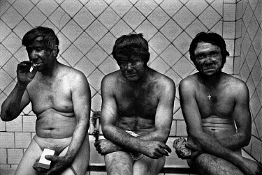 Miners before taking a shower at the end of a shift at the 'Socialist Donbas' coal mine.