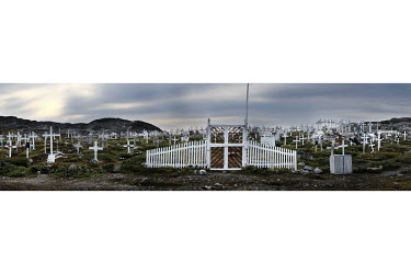 Crosses marking graves in a cemetery in Ilulissat. The decrease in Greenland's population is due to emigration, as natural growth is positive. On 1 July 2013, there were 56,483 inhabitant living in Gr...