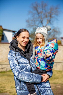 Maria Ustenko and her daughter Mila (3), who fled their home in Kharkiv after the Russian invasion, in the garden at the home of Ukrainian business woman ex-pat Liza Zinova where the mother and daught...