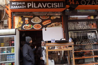 Turkish chef Maksut Askar (L) at Mesur Karakoy Pilavcisi, one of his favourite spots for rice with chicken.