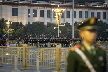 Military honour guards stand on Tiananmen Square during the morning flag raising ceremony during the Chinese Communist Party's congress in the Great Hall of the People.