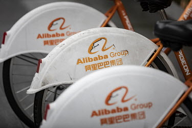 Shared bicycles, used by employees, sit in a lot at the main campus of the Alibaba Group Holding Ltd. headquarters.
