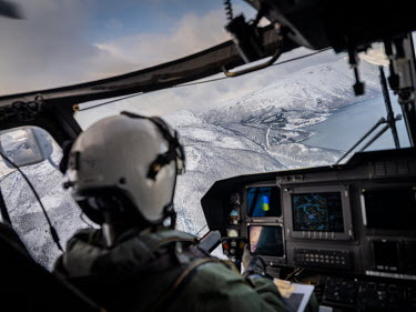 A pilot flies a helicopter high above the Norwegian coast during 'Cold Response 2022' (CR 22), a Norwegian military exercise involving invited allies and partner nations held between 14 March 2022 and...