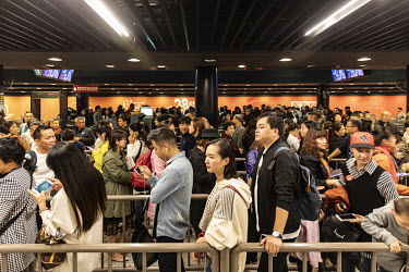 Visitors wait in line to enter the Oriental Pearl Tower.