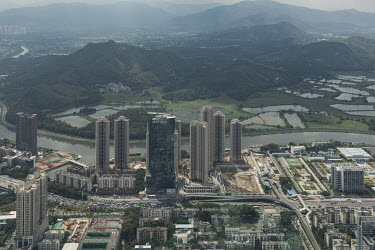 A view of the city of Shenzhen and the farms and wilderness of Hong Kong's New Territories.