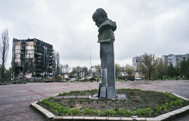A statue of the Ukrainian poet and a national symbol Taras Shevchenko on Central Square with a bullet hole in its head.