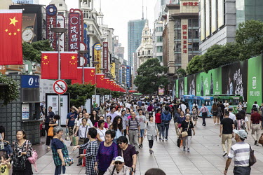 Shoppers crowd onto Nanjing Road shopping street ahead of the National Day break.