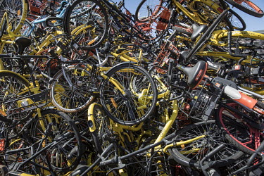 A mountain of discarded shared bicycles piled up in a parking lot. While cheap, convenient, and theoretically environmentally friendly, the craze and commercialisation of shared bikes initially create...