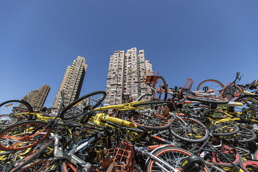 A mountain of discarded shared bicycles piled up in a car park. While cheap, convenient, and theoretically environmentally friendly, the craze and commercialisation of shared bikes initially created m...