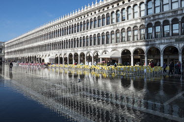 Flooded cafe terrace in Piazza San Marco. The famous square is at the lowest point in Venice and is consequently flooded during Acqua Alta or 'high water' from storm surges from the Adriatic.