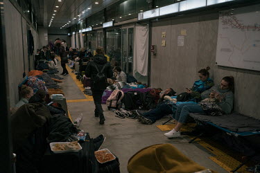 Ukrainian refugees wait at an improvised camp at a bus station while they wait to enter the United States near the San Ysidro border crossing. Some Ukrainians have been travelling for over a month to...