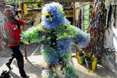 Mayonnaise (Putela), a character made out of recycled plastic bottles, to warn about the abusive use of plastic at 'la vie est belle', an artists' cooperative in the Matonge district. It is a place of...