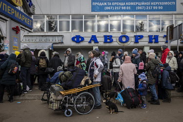 A crowd of several thousand or more, mainly women and children, queue up in the freezing cold at the Shehyni border crossing between Ukraine and Poland, waiting to cross into Europe on foot. Busses to...