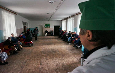Elderly people wait for lunch in the hall at the Chernihiv Geriatric nursing home where 320 pensioners live. 225 of the residents are unable to walk and its director, Victor Vladimirovich Kulaga, has...