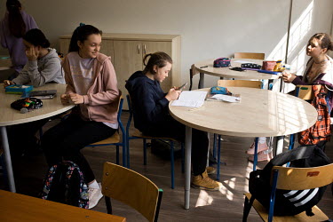 Ilya (13, centre), a Ukrainian boy who fled Kiev after the Russian invasion during a lesson at public primary school number 81 where around 10% of the school's pupils are from Ukraine, most of them ha...