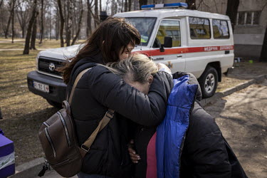 Two women, who had just been evacuated from the frontline town of Irpin, embrace having reached safety on the outskirts of Kyiv. As heavy fighting continued in nearby Irpin, a steady stream of tired,...