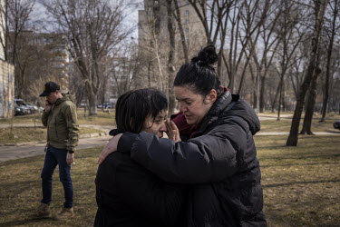 Two women, who had just been evacuated from the frontline town of Irpin, embrace having reached safety on the outskirts of Kyiv. As heavy fighting continued in nearby Irpin, a steady stream of tired,...