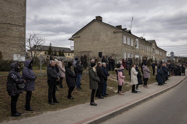 Mourners attend the funeral ceremony for Senior Sergent Yevhen Verveyko of the Ukranian National Army, who was killed fighting against Russian forces.