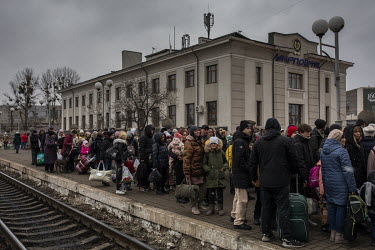 A train full of people, mainly from the besieged city of Kharkiv, arrive into Lviv train station.