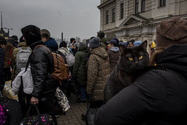 A train full of people, mainly from the besieged city of Kharkiv, arrive, some with their pets, into Lviv train station.