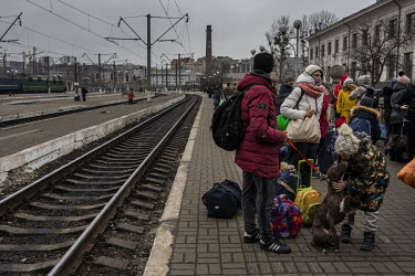 A train full of people, mainly from the besieged city of Kharkiv, arrive, some with their pets, into Lviv train station.
