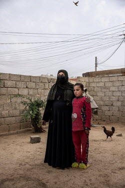 Katbeeah Ahmed and her granddaughter Rahaf (10), who is the sole survivor of an airstrike in Al Tanak that killed 11 members of her family. US forces launched the airstrike in 2017 during the battle t...
