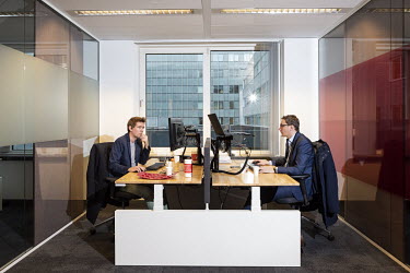 Employees at work at the headquarters of PricewaterhouseCoopers PwC in Amsterdam.From FINANCIAL ZONE, a series on banks and financial companies in Belgium and The Netherlands.