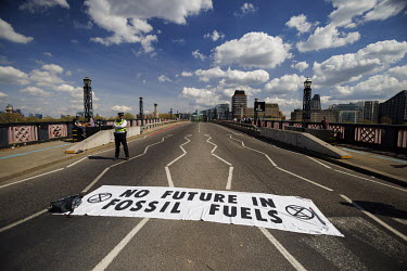 Extinction Rebellion activists block Lambeth Bridge in a protest against fossil fuels.
