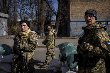 Territorial Defence Volunteers at a checkpoint in western Kyiv.