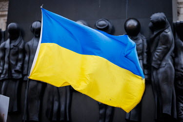 An Ukrainian flag flies near the Cenotaph during a solidarity protest in Whitehall against the Russian invasion of Ukraine. The protest brought together Ukrainians, Russians, Uyghurs and others.