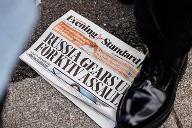 A copy of the Evening Standard newspaper with a headline from the war in Ukraine lies on the ground during a solidarity protest in Whitehall against the Russian invasion of Ukraine. The protest brough...