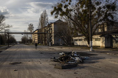 A crushed car and other detritus litters a main intersection in the abandoned town of Chernobyl. Ukraine regained control of the area after Russian forces retreated back over the border with Belarus o...