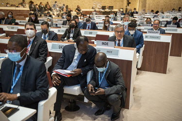 Cote d'Ivoire (Ivory Coast) diplomats in consultation as the Indian Ambasador speaks at the Emergency debate on Ukraine at the UN Human Rights Council.