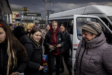 A group of people arrive in Kyiv having managed to escape the besieged city of Chernihiv. Some had only left the city that morning, a now dangerous journey that involves crossing the Desna river by bo...